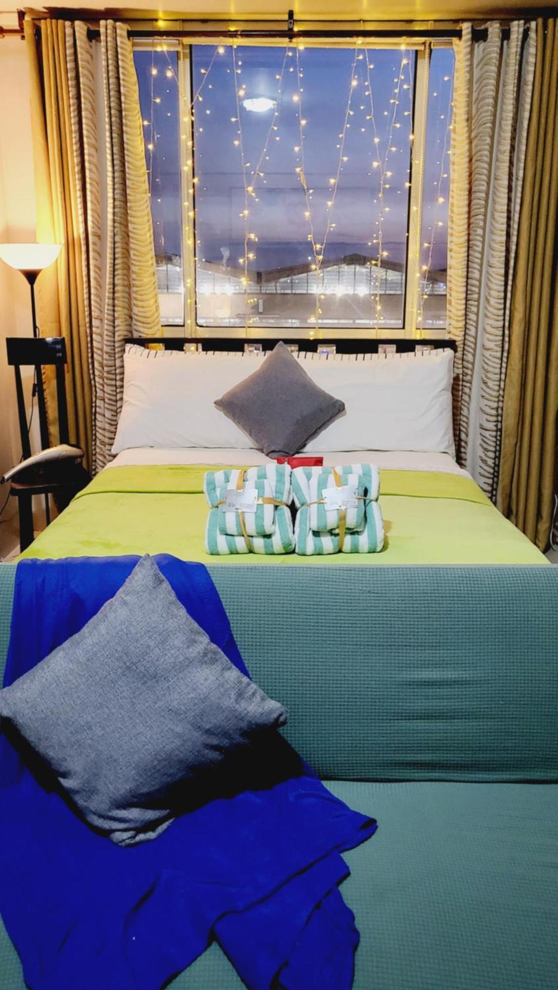 One Palm Tree Villas Condominium - Studio 7Th Fl With Balcony - Across Terminal 3 Airport Pasay Bagian luar foto